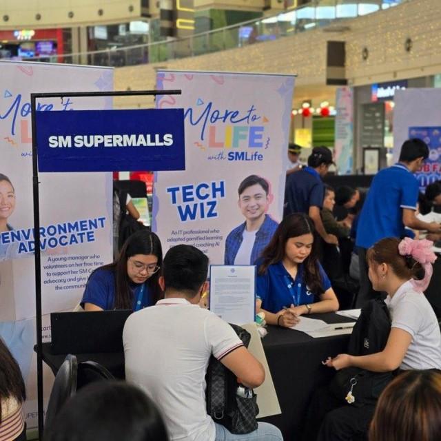 Job seekers explore career opportunities at the SM Supermalls Job Fair at SM North Edsa.