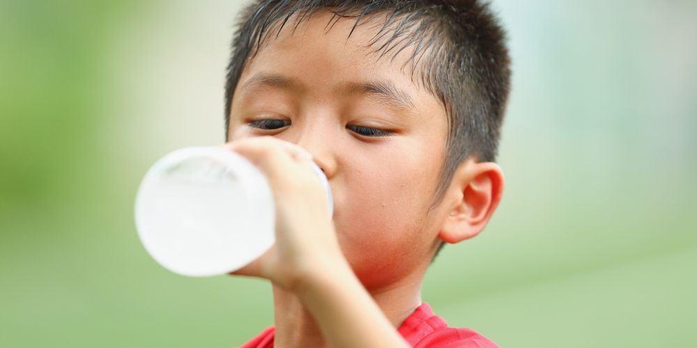 Why are children more at risk in extreme heat?