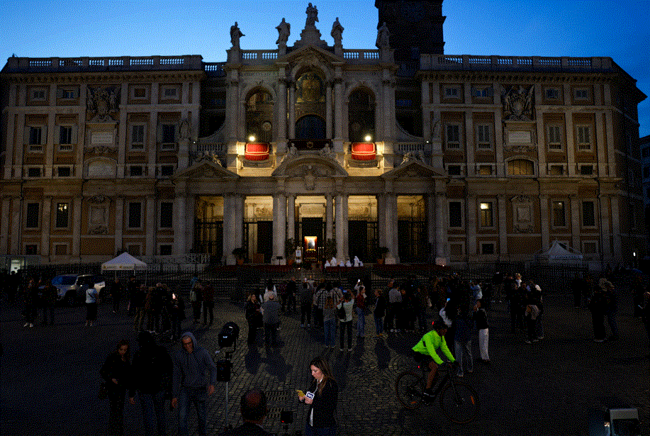 People wait at the Papal Basilica of Saint Mary Major in Rome, Italy