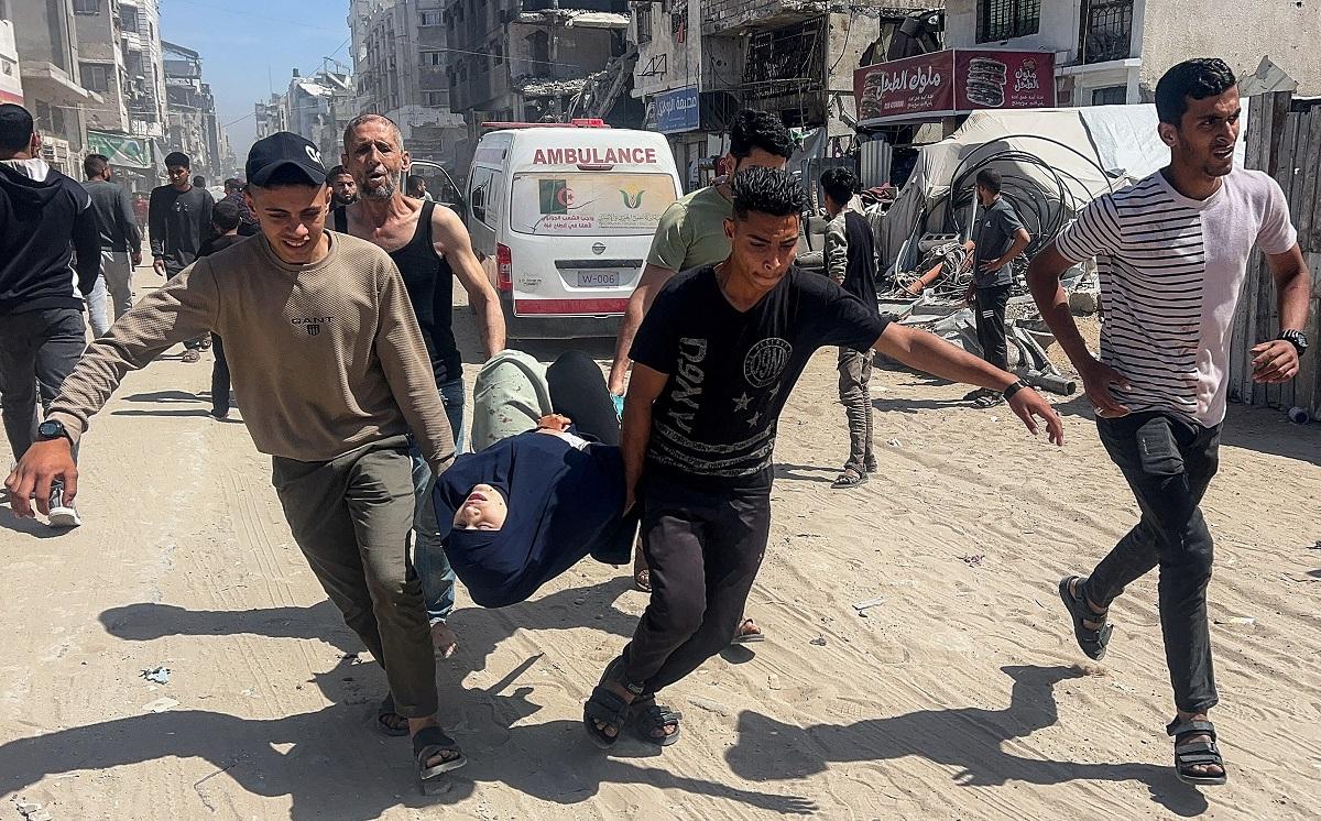 Israeli strikes on school housing displaced and market kill 38 in Gaza, medics say