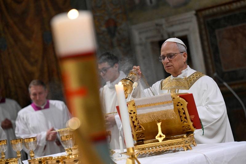 New Pope Leo XIV vows to bring light to world's 'dark nights'