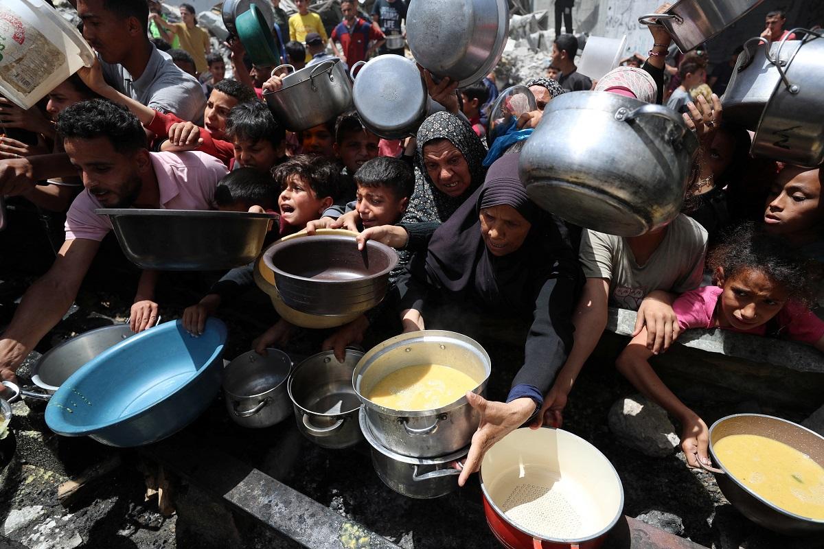 Father of six killed 'for piece of bread' during Gaza aid distribution