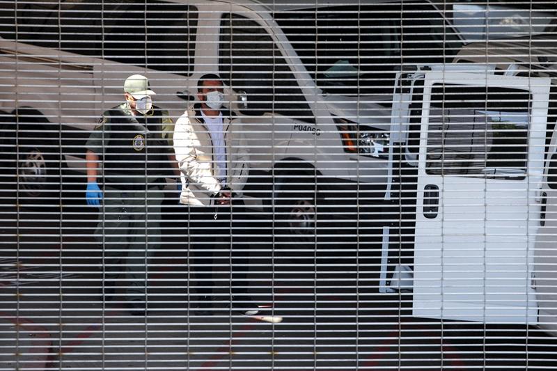 ICE arrests migrants at courthouses, opens door to fast-track deportations