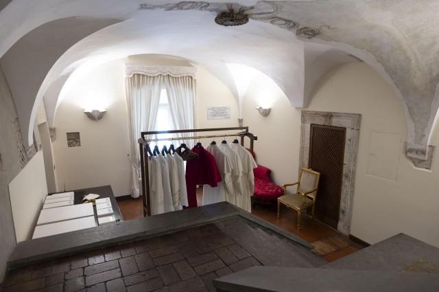 Above and below: The Room of Tears and the vestments of varying sizes awaiting the new pope. Photos: Vatican Media