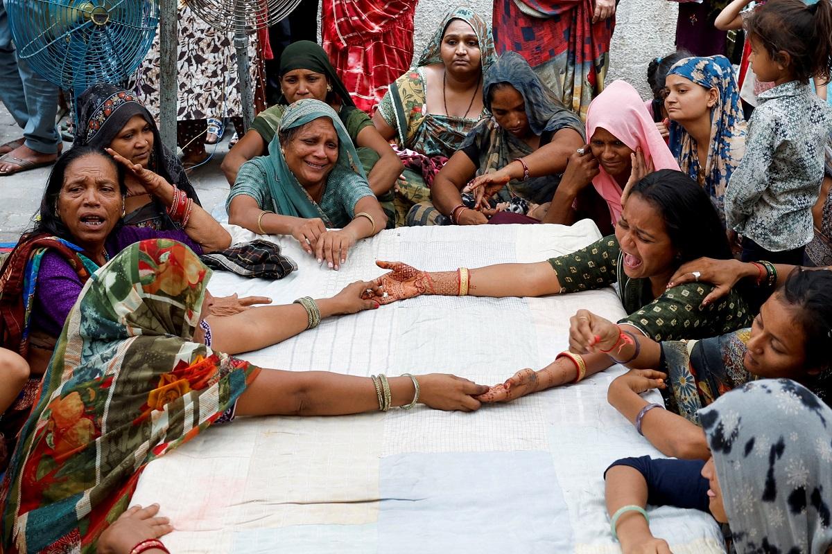 Families of Air India crash victims mourn their loved ones | Photos ...