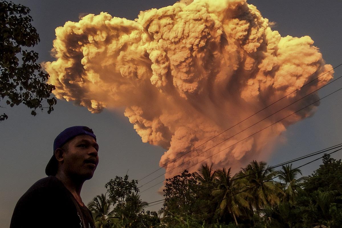 Indonesia volcano spews colossal ash tower, alert level raised
