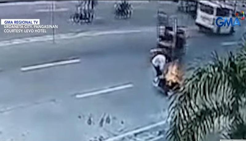 Motorcycle catches fire along highway in Pangasinan