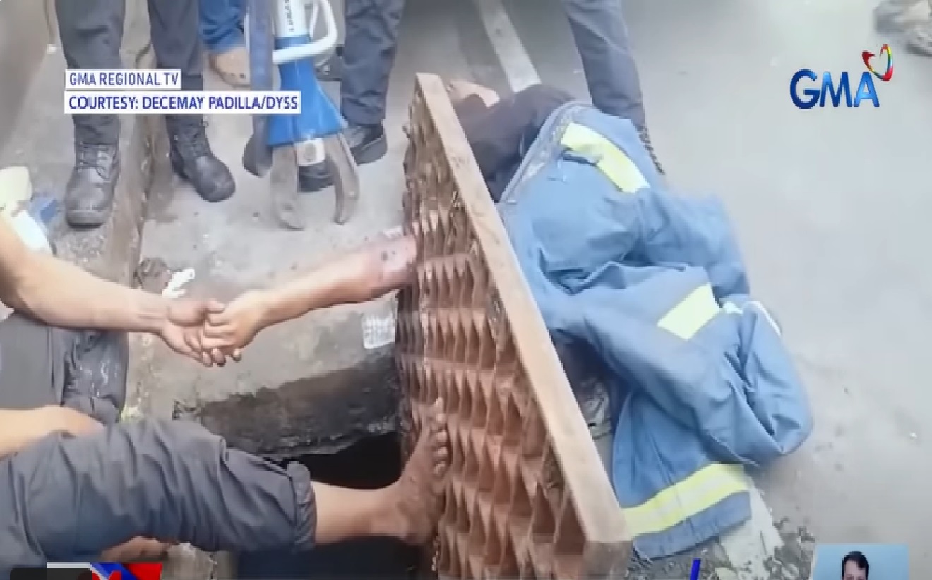Binatilyong mamumulot ng barya, naipit ang braso sa bakal na takip sa kanal sa Cebu