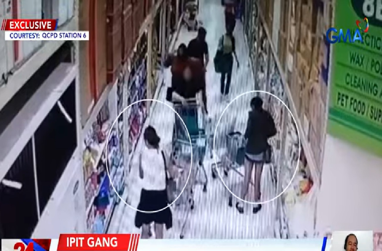 Modus ng 'Ipit-gang' para nakawan ang isang babaeng namimili sa grocery, nahuli-cam