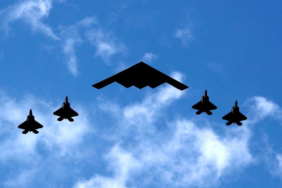 US Air Force B-2 Spirit Stealth Bomber and US Marine Corps F-35 fighters
