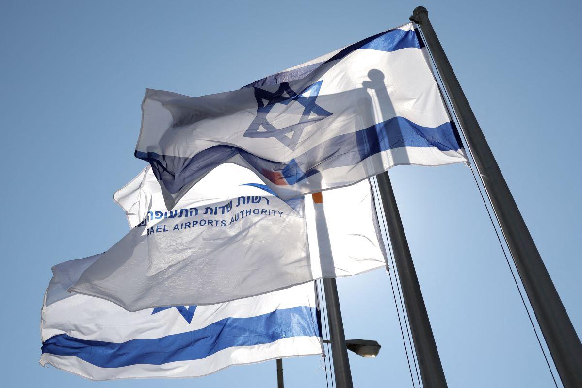Israeli flags flutter at the Haifa International Airport in Haifa, Israel