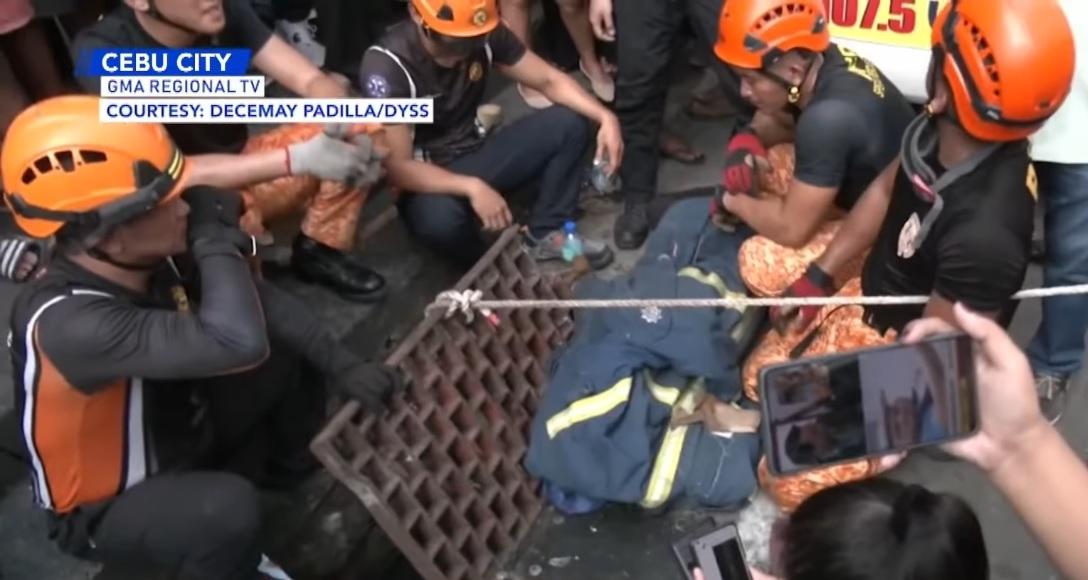 Rescuers take hours to free teen"s arm from canal grating in Cebu City