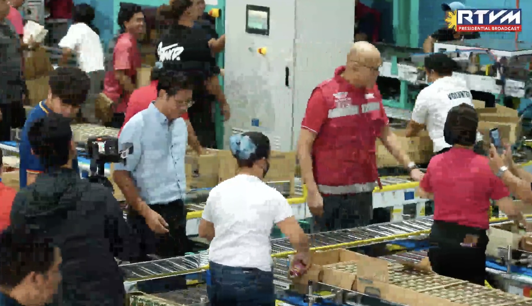 Marcos inspects packing of food items for residents affected by Crising