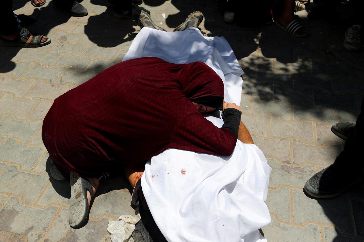 Israeli troops fire on Palestinians seeking aid in Gaza; 67 killed