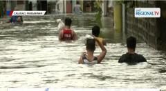 Baha sa ilang barangay sa Calasiao, Pangasinan, umabot hanggang bubong sa kasagsagan ng ulan thumbnail