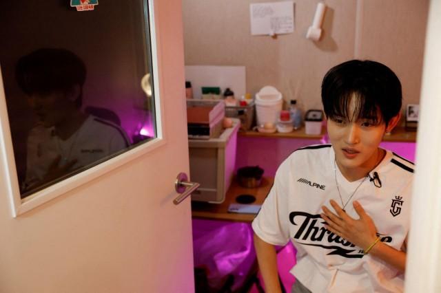 Seok, a member of K-pop boy band 1VERSE who defected from North Korea, speaks during an interview with Reuters in his room at the 1VERSE's label Singing Beetle in Seoul, South Korea, June 26, 2025. REUTERS/Kim Soo-hyeon