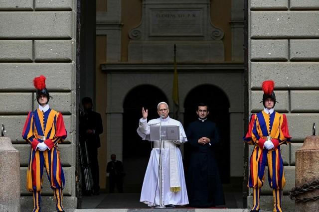 Pope Leo XIV addresses the crowd for his first Angelus prayer, in Piazza della Liberta in front of Palazzo Apostolico in the summer papal estate in Castel Gandolfo, near Rome, Italy, July 13, 2025. Tiziana Fabi/ Pool via REUTERS