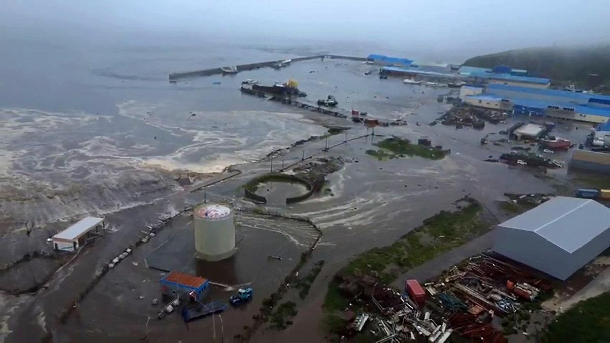Russian TV shows buildings swept away as tsunami hits coast