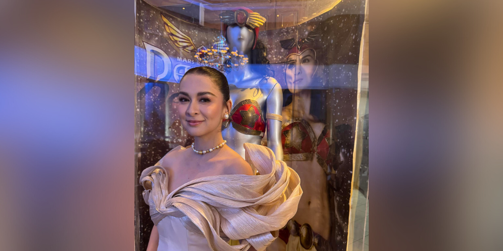 Dingdong Dantes flexes Marian Rivera’s photo with Darna costume display