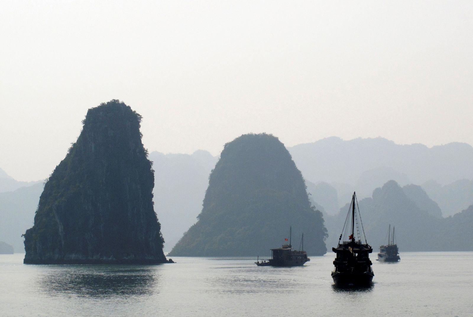 Tourist boats cruise in Halong Bay in this January 11, 2009 photo