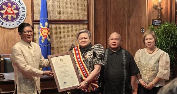 Marcos swears in Tess Lazaro as DFA secretary 