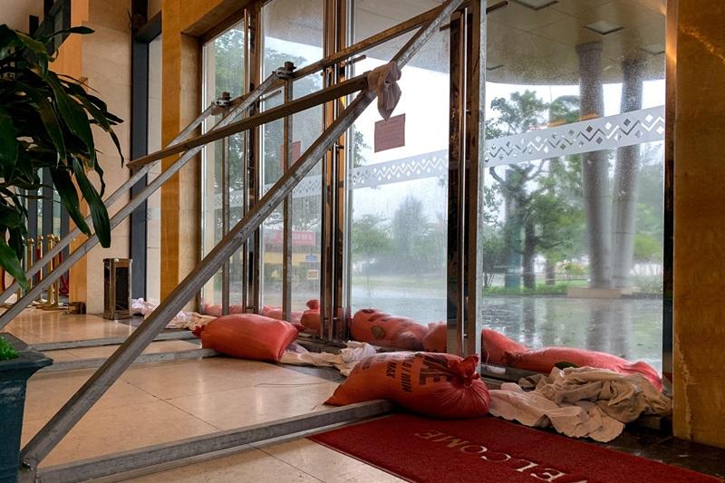 Trees down, homes flooded as Typhoon Kajiki batters Vietnam