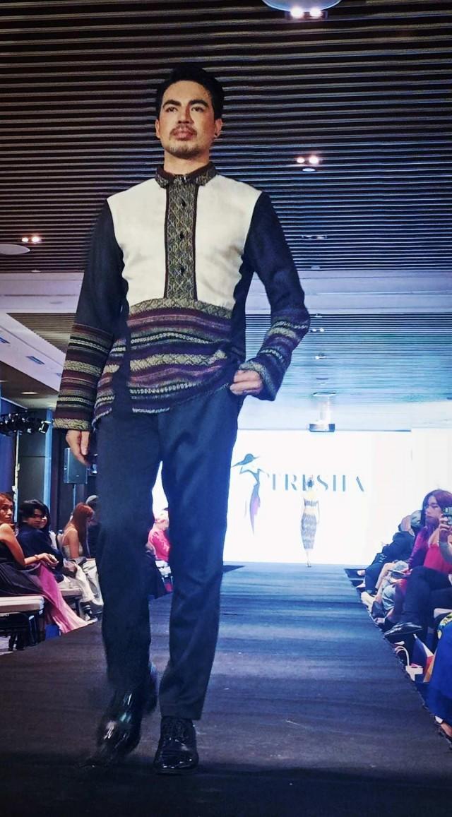A model takes the runway wearing a creation of Filipino designer Tresh Verne Asis from Misamis Oriental at the Precious of Malaysia International Cultural Fashion Week. Courtesy: Dong Omaga-Diaz/ Facebook