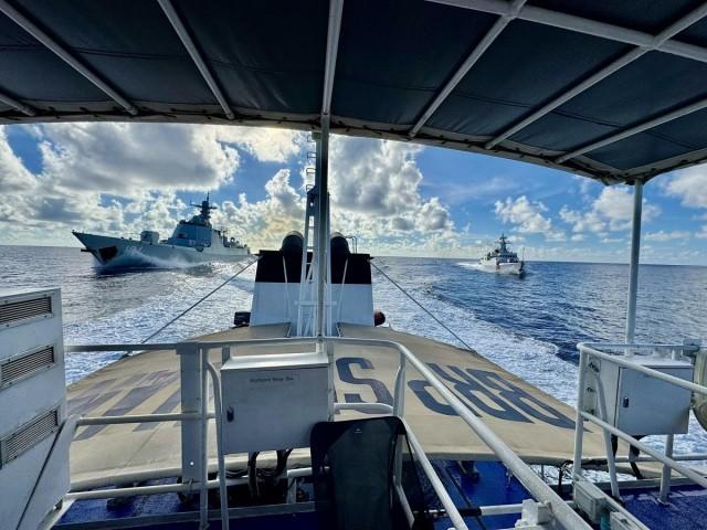 People's Liberation Army (PLA) Navy warship 164 and China Coast Guard (CCG) ship 3104 are seen in hot pursuit of the Philippine Coast Guard's BRP Suluan, in the waters near Bajo de Masinloc, West Philippine Sea, before they collided into each other, Monday, Aug. 11, 2025. RAFFY TIMA/ GMA Integrated News