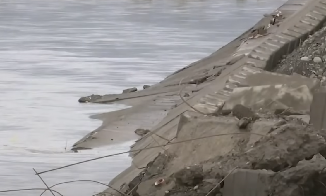 Newly built dike portion on Busuanga River gives way