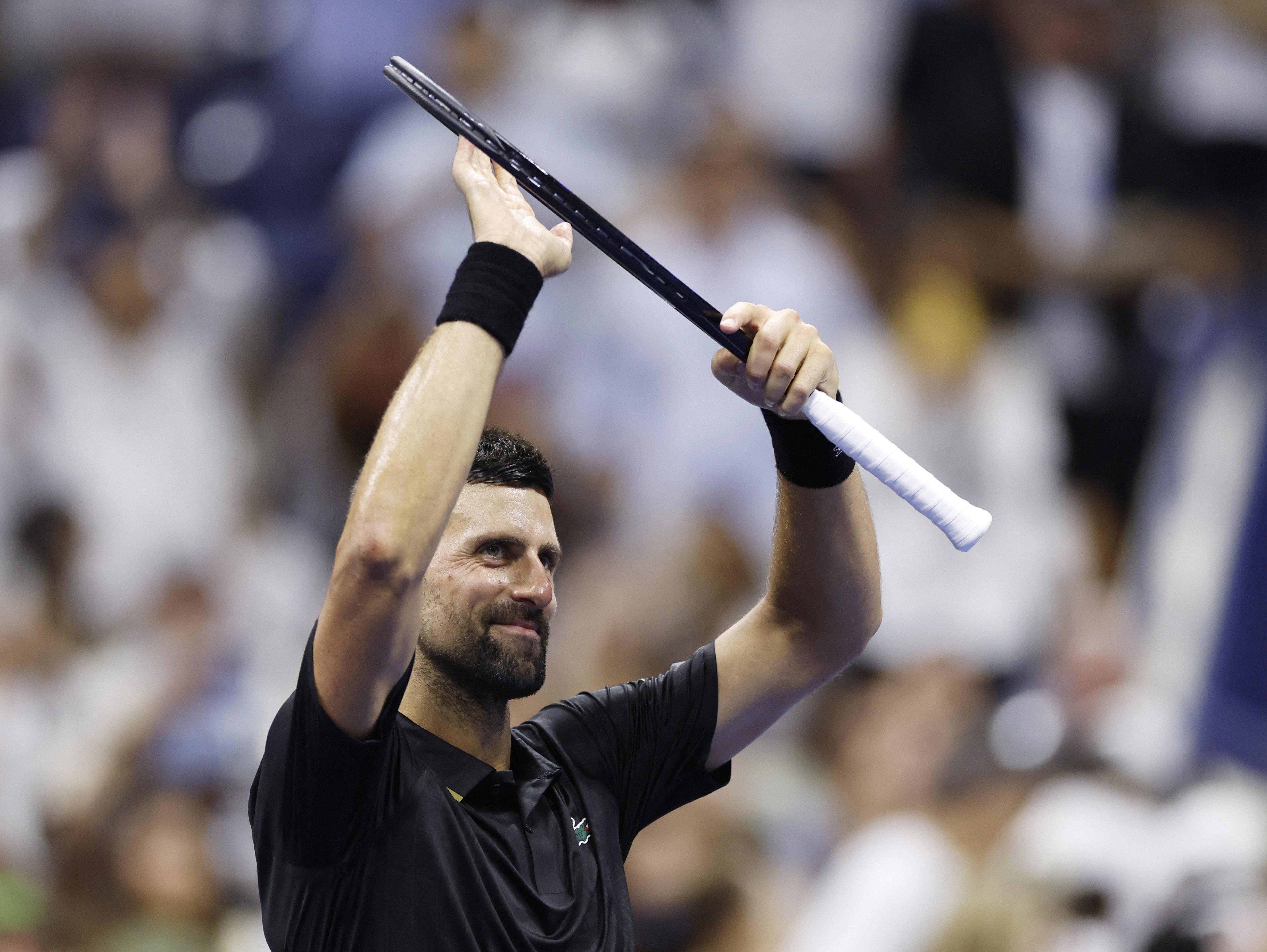 Djokovic battles past Tien to reach US Open second round