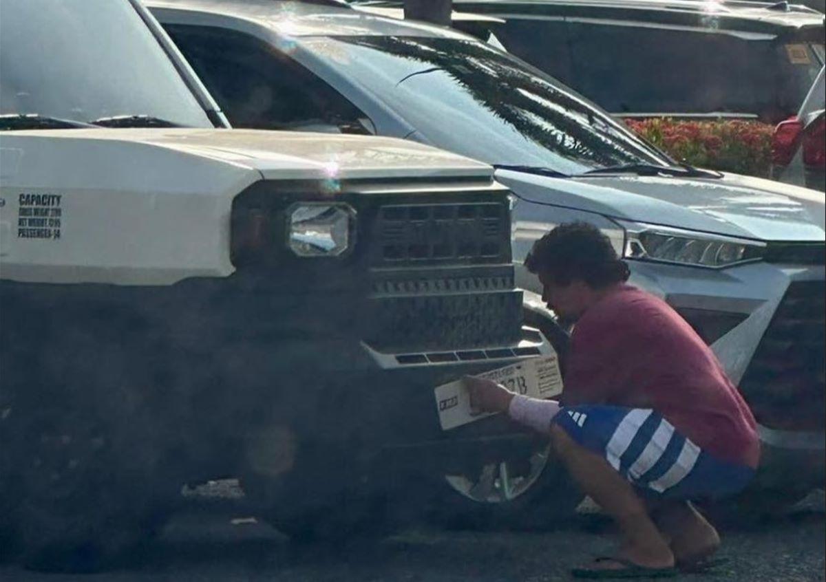 LTO temporarily suspends license of driver caught changing license plate