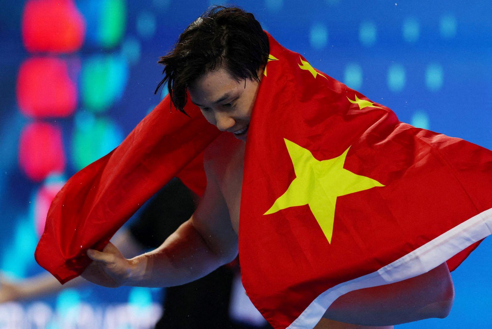 China's Qin delivers 'lane eight miracle' to win 200 breaststroke title
