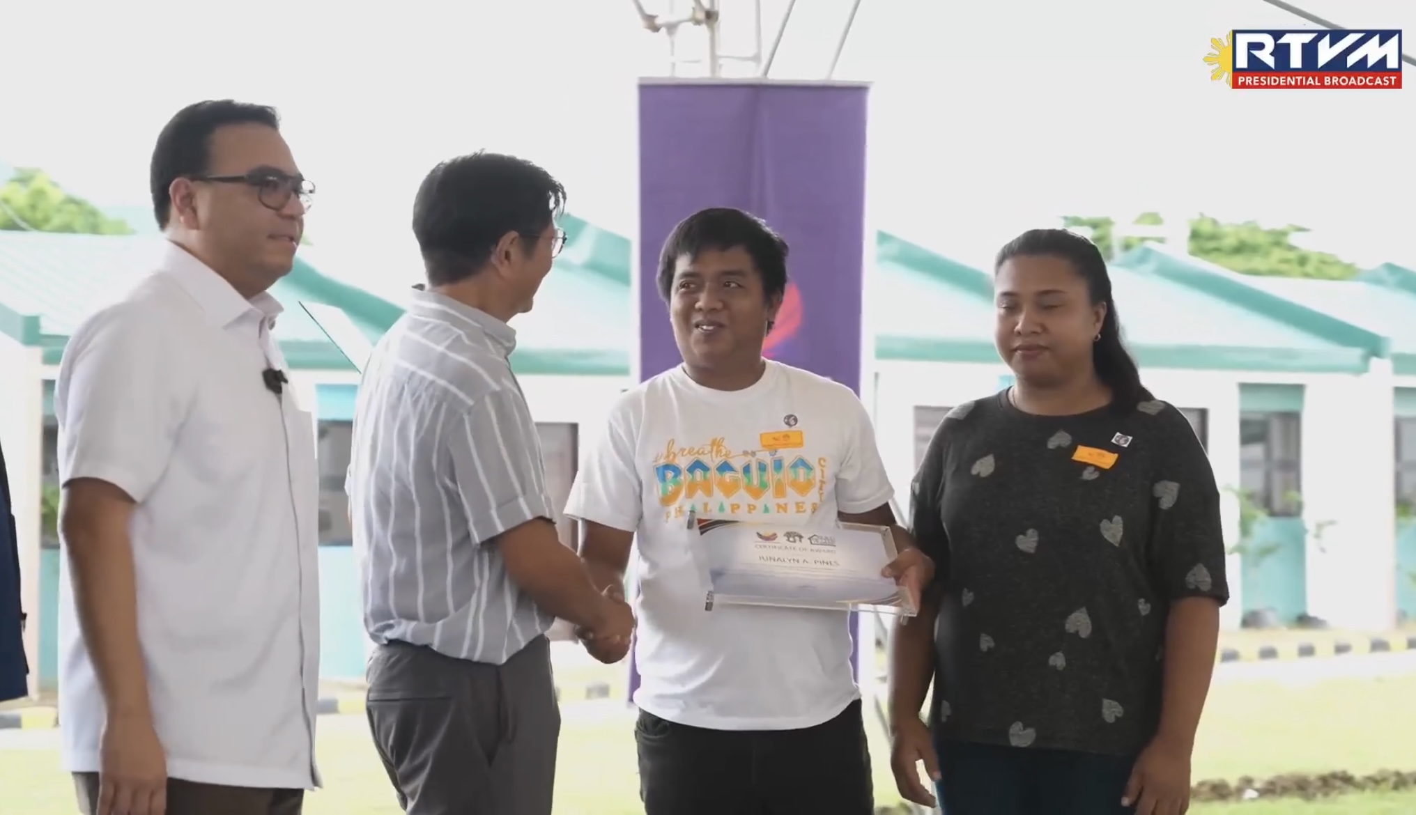 Marcos turns over housing units in Laguna