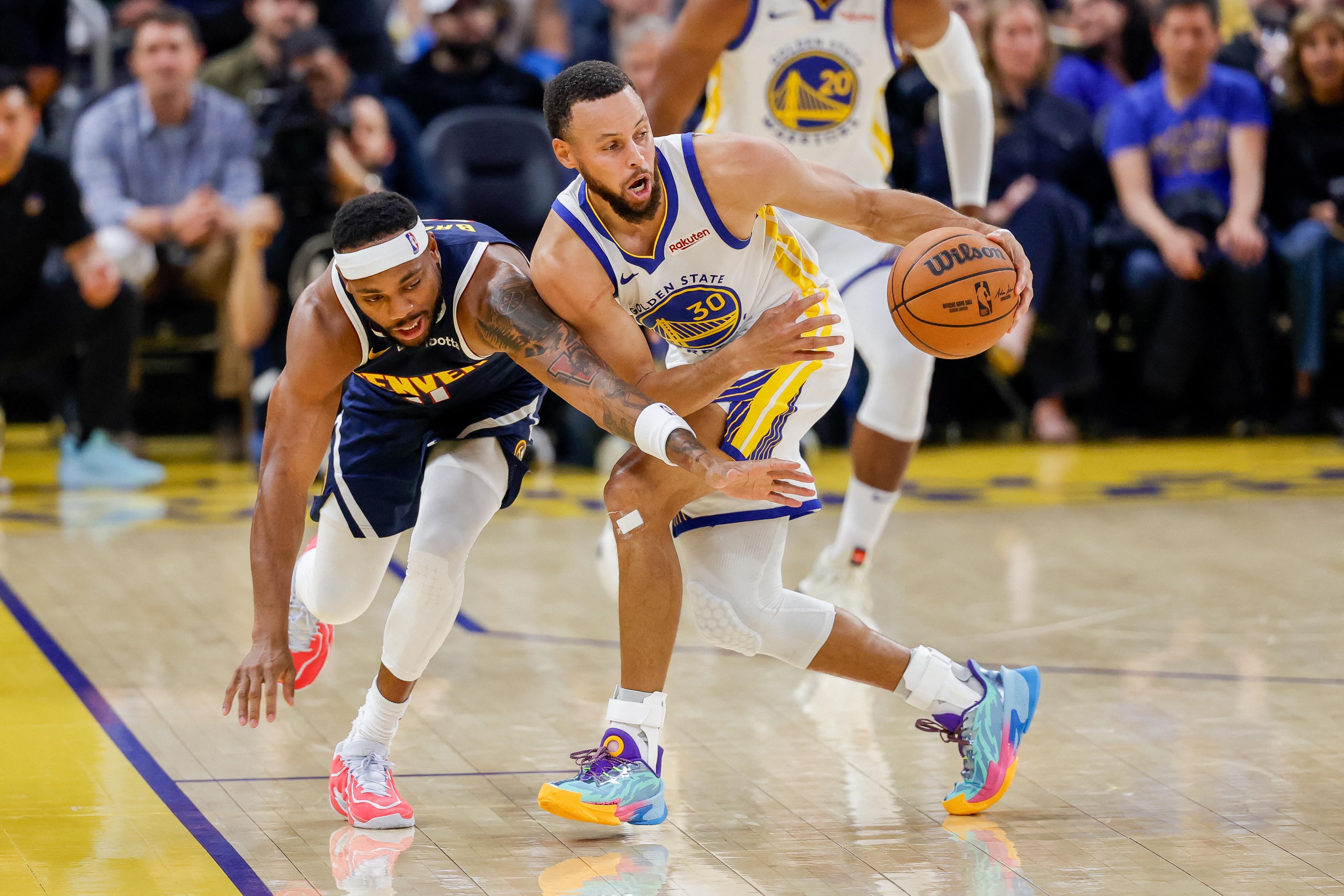 NBA: Steph Curry's 42, Warriors top Aaron Gordon's 50, Nuggets in OT