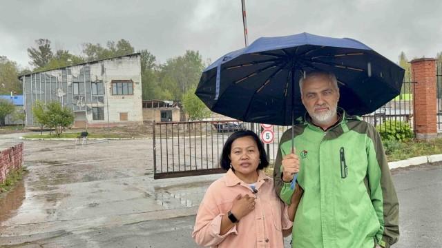Ruby Gallego and her husband Igor stand in front of the warehouse in Irpin where they found shelter during the Battle of Bucha in March 2022. The couple was at their house in Bucha when the Russian invasion happened. They escaped and survived the gun battles on Irpin Bridge and found and stayed in this warehouse to hide from Russian forces. They were saved by Ukrainian soldiers later on. Andy Peñafuerte III