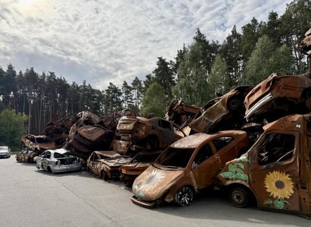 Along the main road in Irpin lies a pile of cars burnt during the Battle of Irpin. Now called the Car Cemetery, the landmark shows the vehicles used by residents who tried to escape the occupation but were caught between gunfire. The vehicles still bear bullet holes and shrapnel. Andy Peñafuerte III
