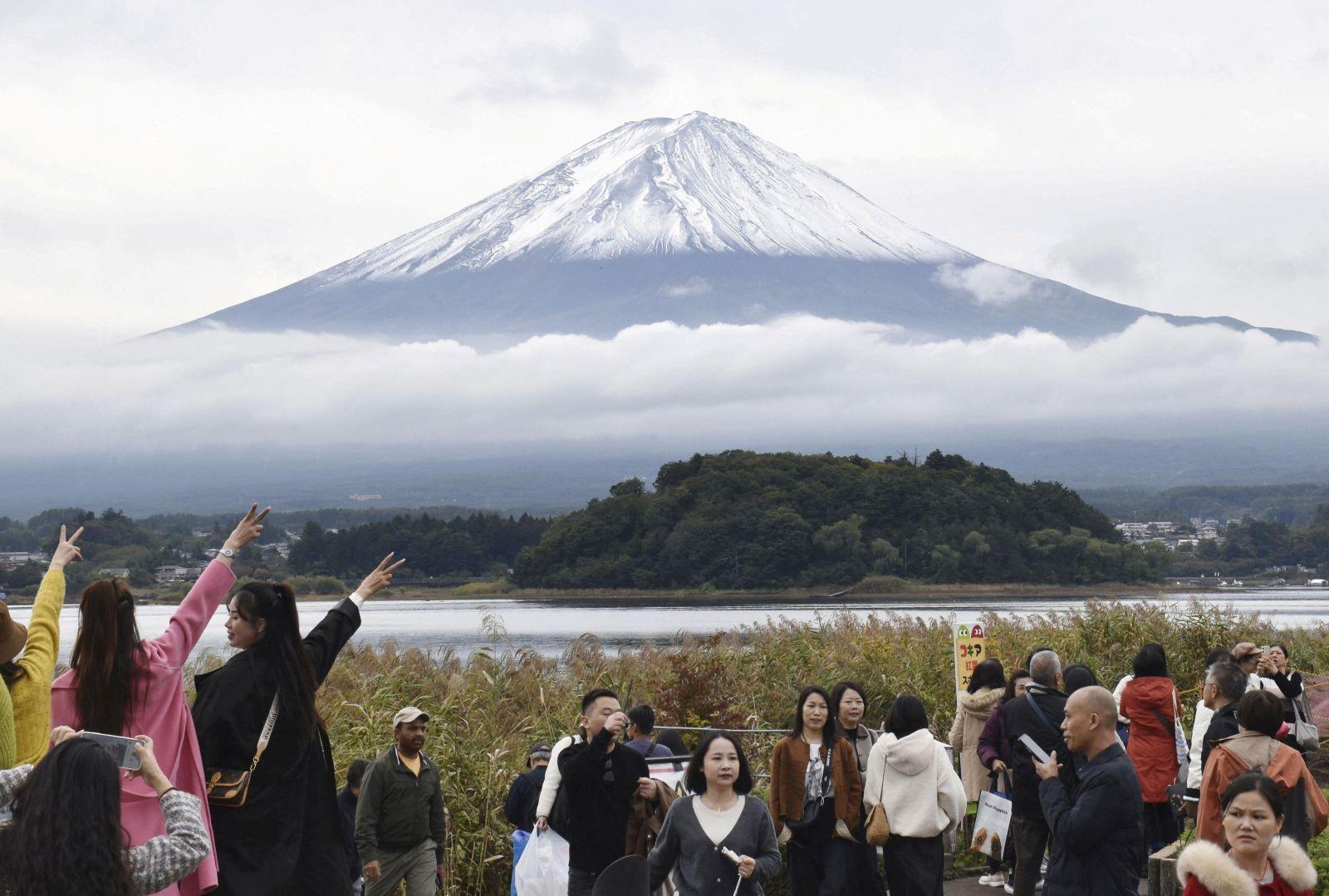 Japan's Mount Fuji sees snow for first time this winter, 21 days later than usual