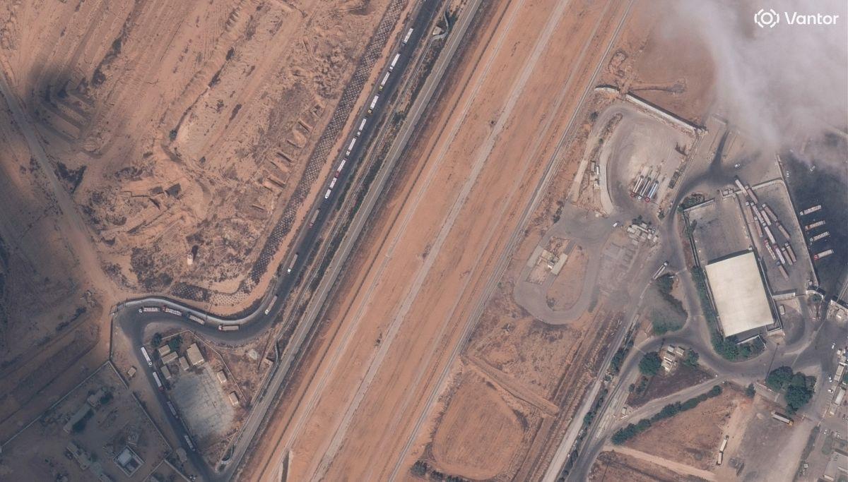 Aid trucks roll into Gaza as dispute over hostage bodies is paused