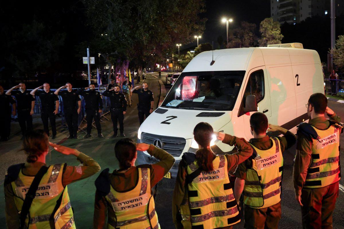 Hamas hands over hostage bodies after Israel threatens aid cut