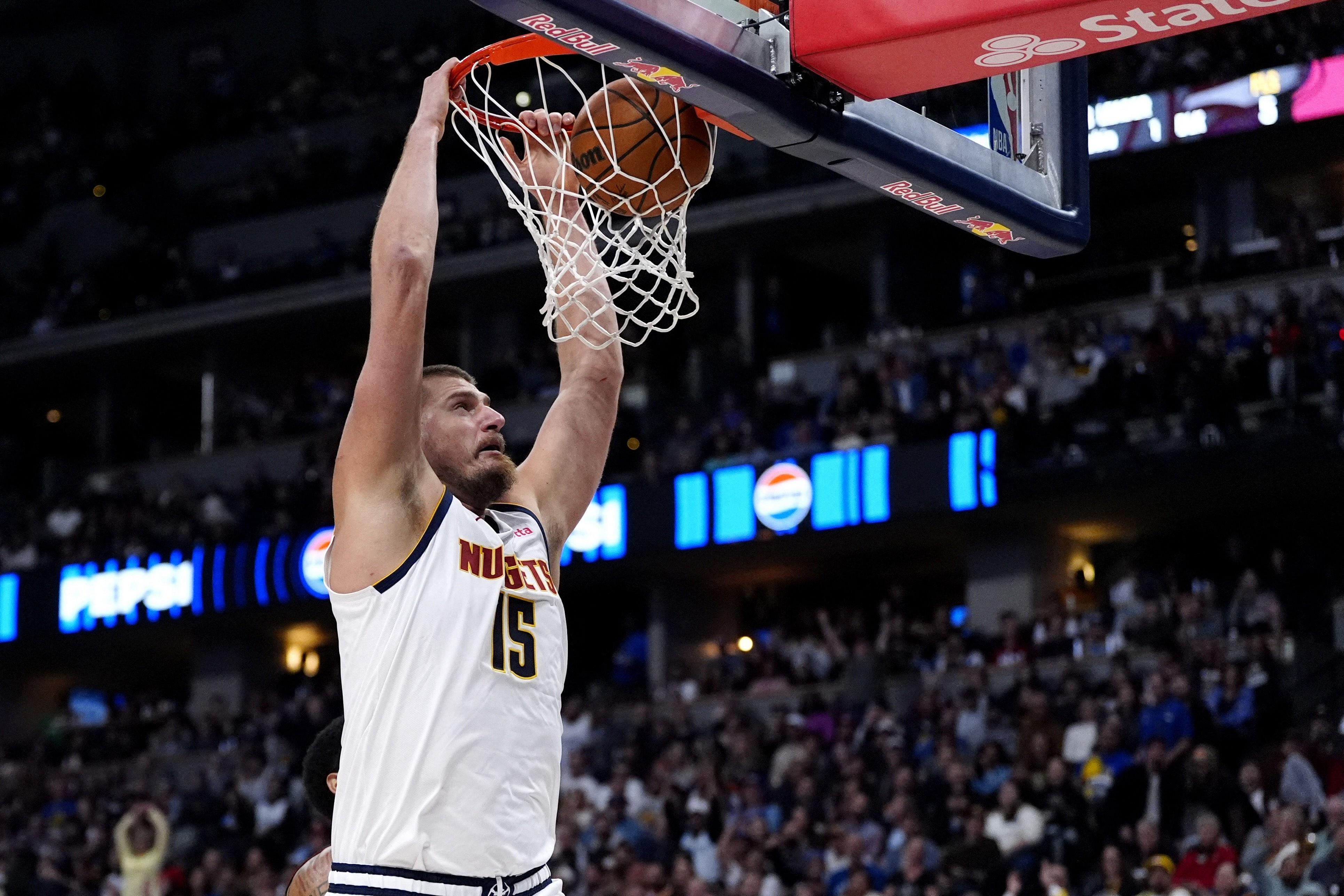 NBA: Nikola Jokic-led Nuggets top Heat to remain perfect at home