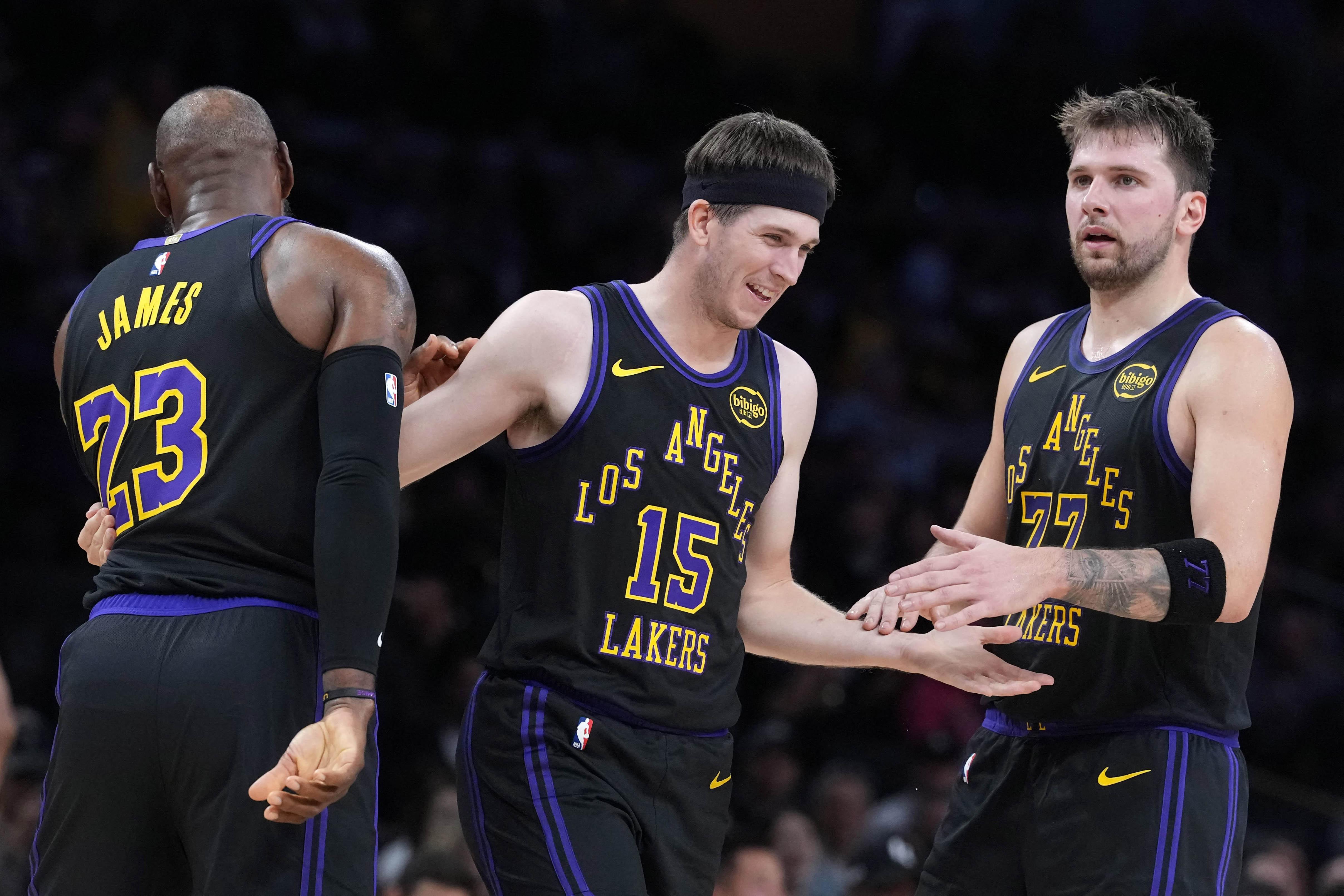 NBA: Lakers' LeBron James Austin Reaves and Luka Doncic