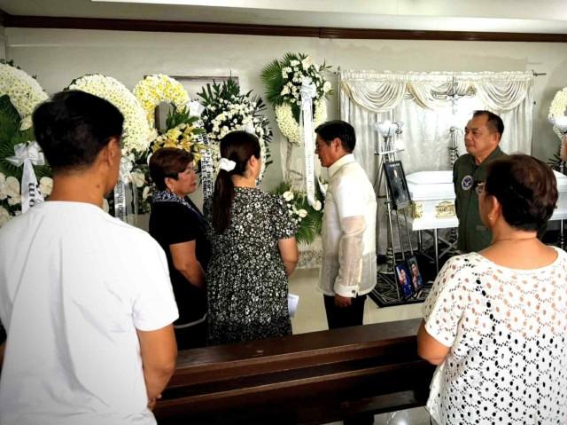 President Ferdinand Bongbong Marcos Jr extends his sympathies to the bereaved family of Captain Paulie B. Dumagan PAF during his visit at the PAF Mortuary, Colonel Jesus Villamor Air Base, Pasay City. Photo from PAF