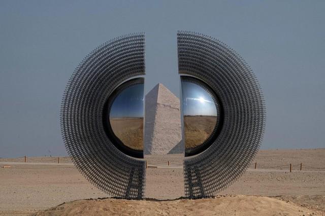 The art installation The Shen by artist by Mert Ege Kose stands near the Giza pyramids necropolis during the fifth edition of the Forever is Now art exhibition by Art d&acirc;Egypte on November 11, 2025. Khaled Desouki/ AFP