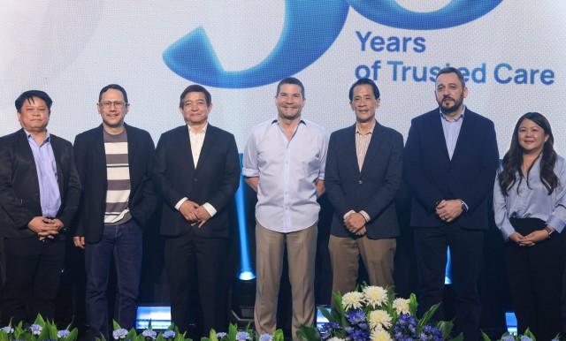 Edu shares a photo with TMC Executives. From left to right: Mr. Jojo C. Dionaldo, Group Chief Information Officer; Dr. Christian G. Delos Reyes, Group Chief Marketing and Business Development Officer; Dr. Ruben G. Kasala, Executive Vice President and CEO of The Medical City Ortigas; Mr. Jose Xavier B. Gonzales, Chairman of the Board; Dr. Stuart Bennett, President and Group CEO; and Ms. Jo-Ann D. Maluenda, Group Chief Human Resource Officer. 