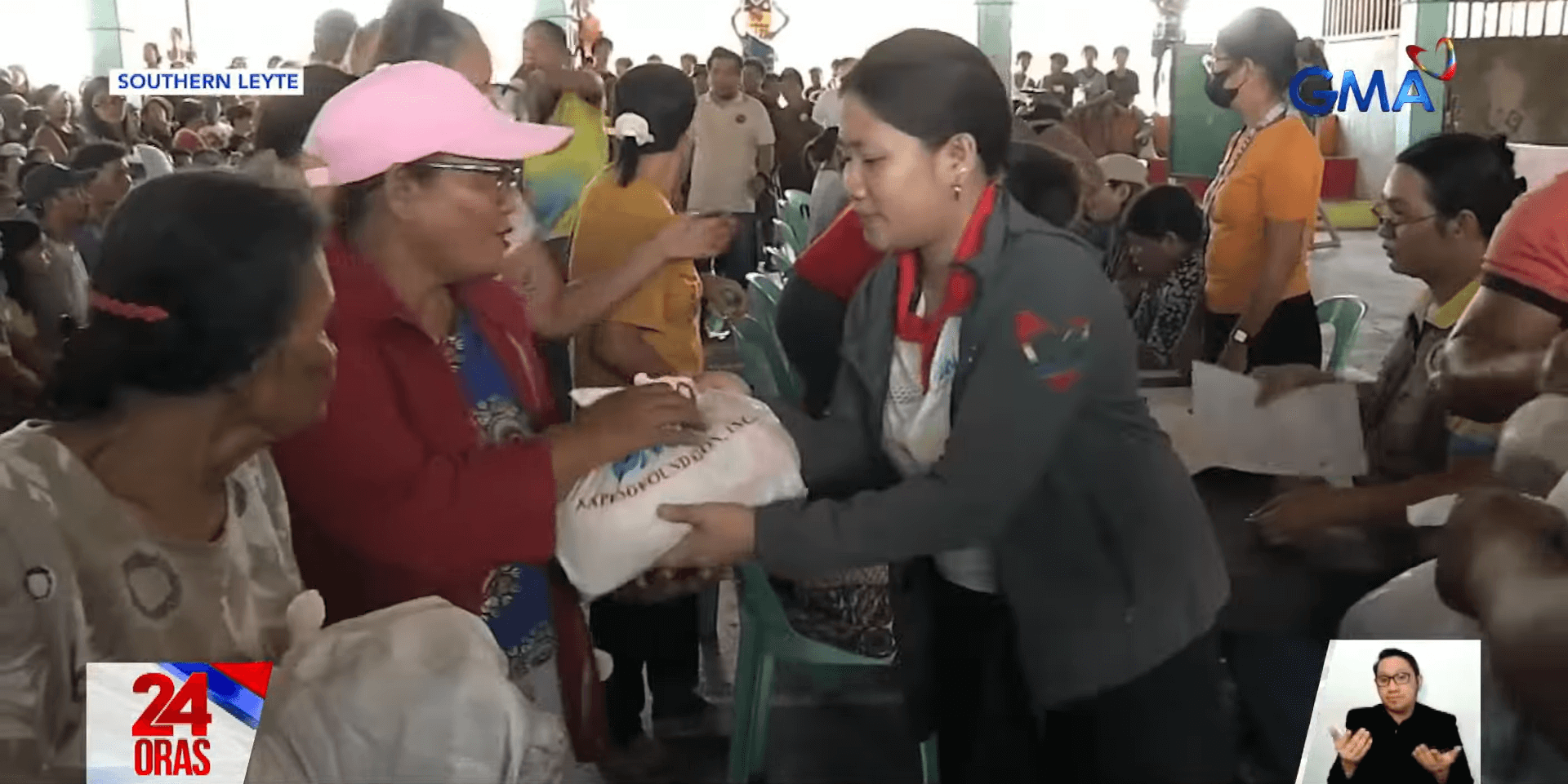 Residents affected by Tino in Southern Leyte, Eastern Samar receive food packs from GMA Kapuso Foundation