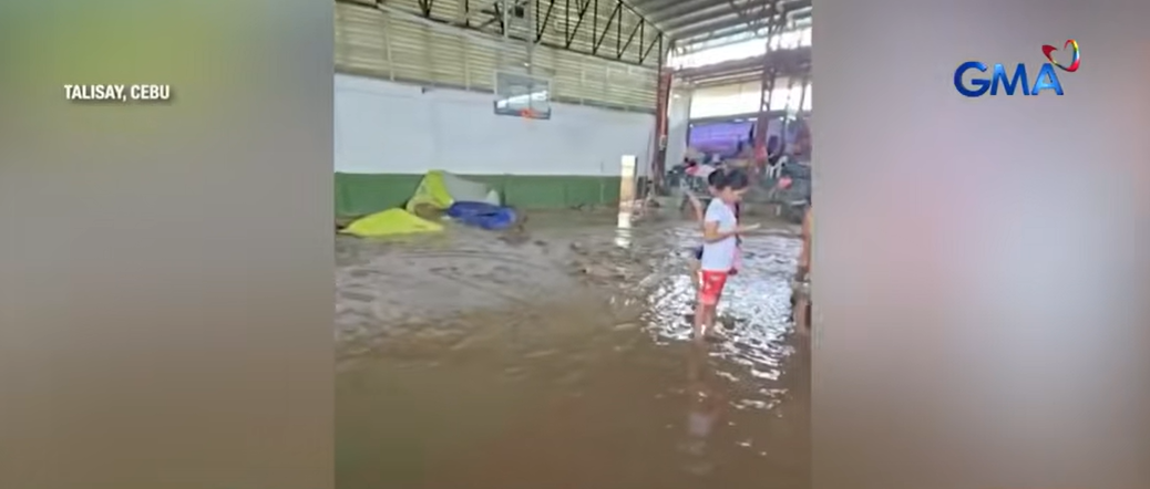 After losing homes, Talisay City residents deal with muddy temporary shelter