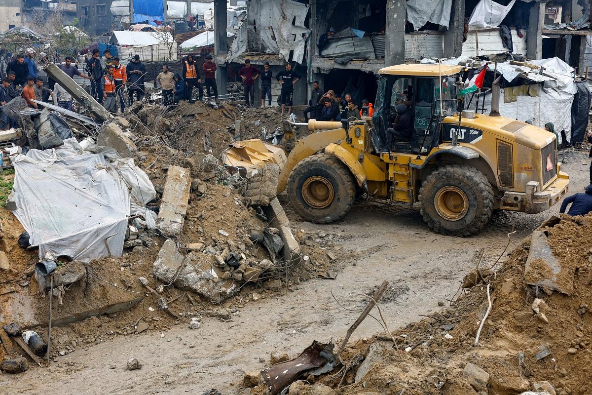 Gazans struggle to retrieve bodies as storms lash war-damaged buildings