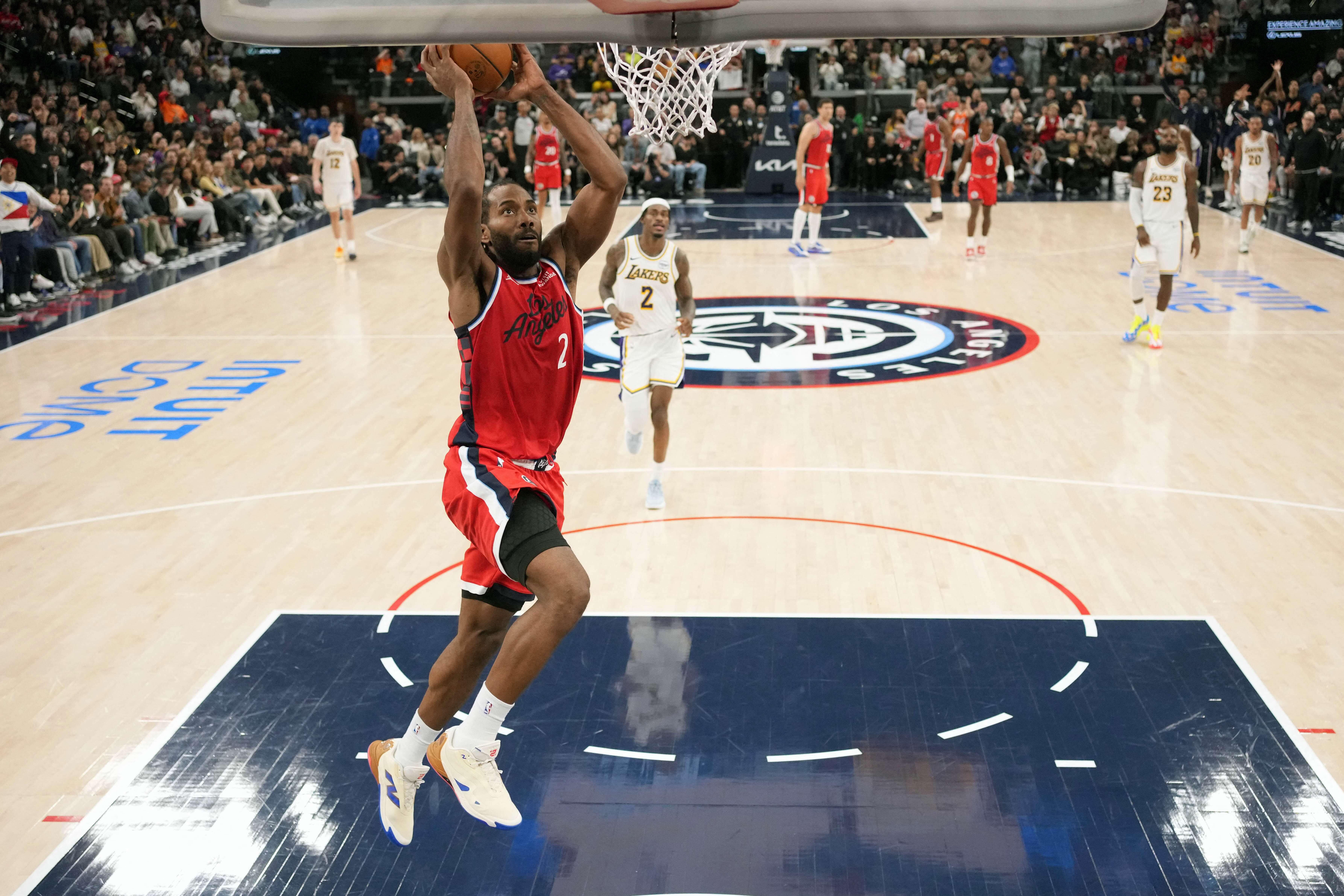 NBA: Clippers rout Lakers, halt 3 skids; Luka Doncic injures leg