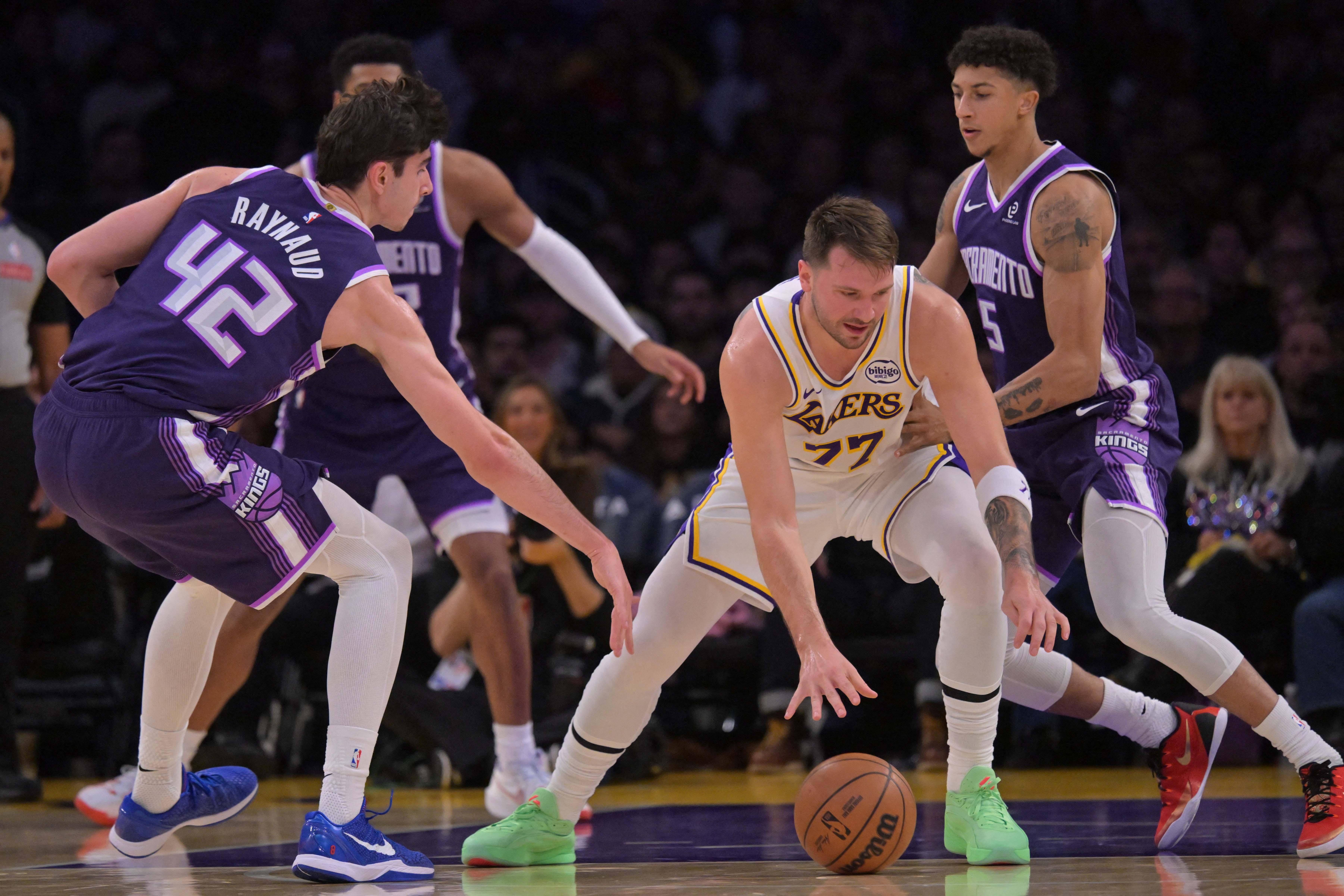 NBA: Luka Doncic thrives, LeBron James hurt as Lakers dispatch Kings