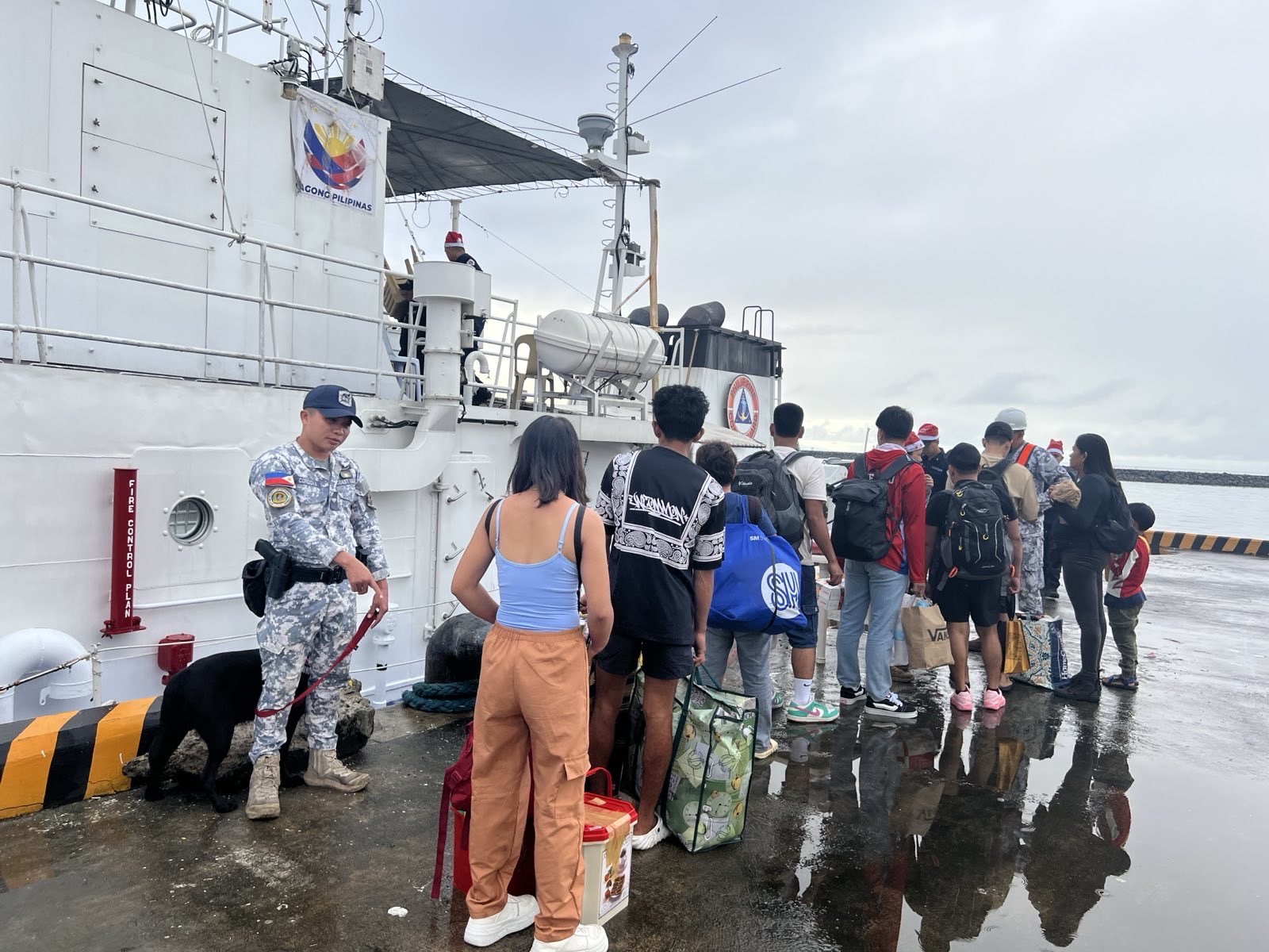PCG deploys vessels to ferry stranded passengers at Lucena Port amid holiday rush
